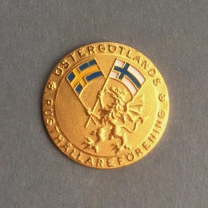 Detta märke tillverkades av Sporrong för Östergötlands Rusthållareförening.